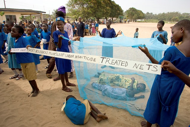 Some Nigeria school children performing a skit that aim at promoting the effectiveness of mosquito nets in preventing malaria. Photo credit: Mike Dubose/UMNS
