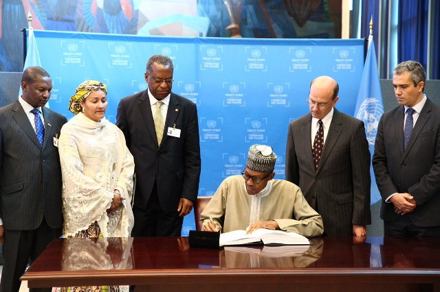 President Muhammadu Buhari Signing the Climate Change agreement