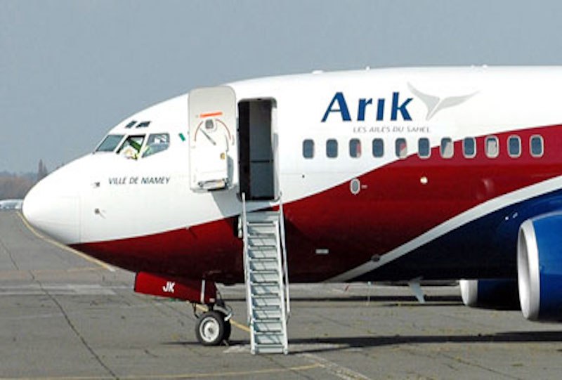 Passengers disembark Arik Air after crisis alert