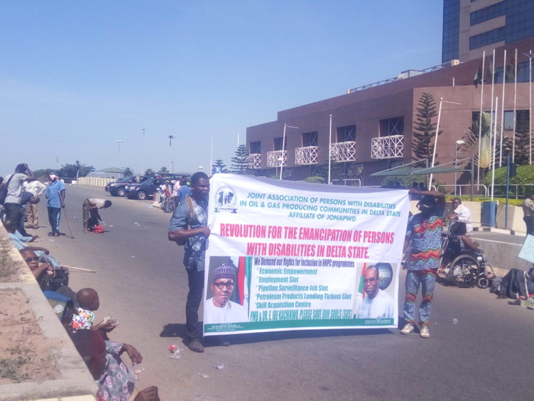 Physically challenged protesters lay siege to NNPC headquarters