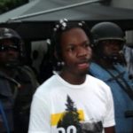 File: Naira Marley being led by police. 2020. Photo: Premium Times