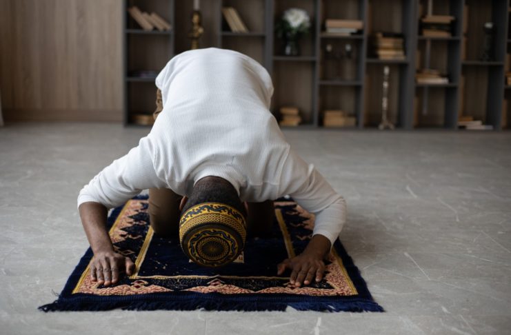 A Muslim man praying. Photo by Monstera