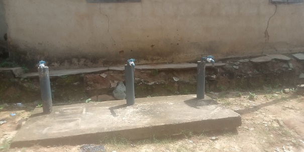 A row of non-functional water taps at Udo- Ofeme