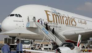 Passengers disembarking from an Emirates Airline plane IATA