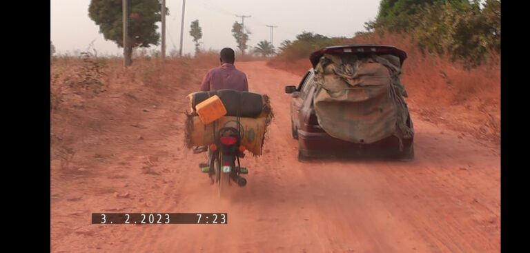 Mud smeared, dust covered: An Abuja community’s daily commute struggle