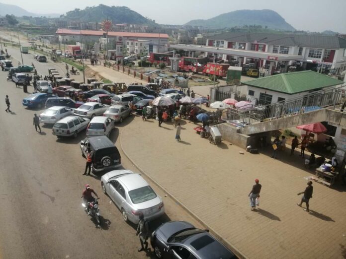 Consumers in long queues at NIPCO filling stations in Kubwa. May 2023