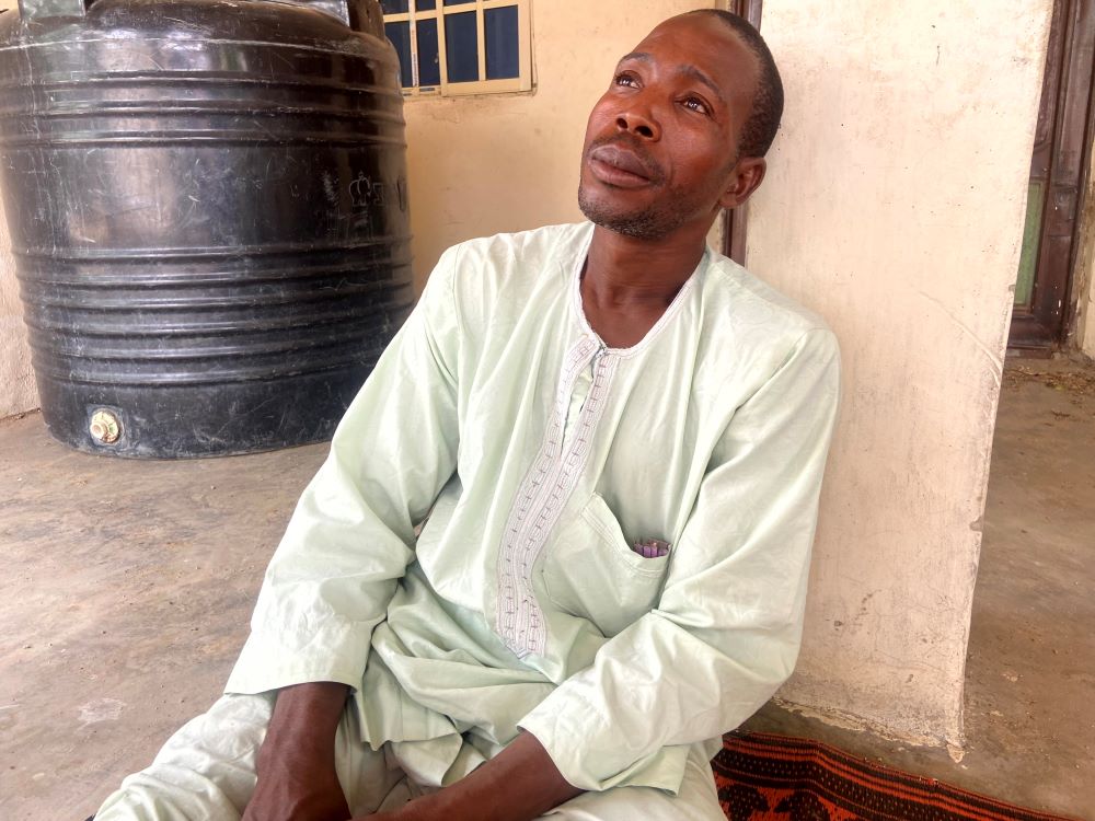 Abubakar works as farmhands with hope that they would be left off the hook