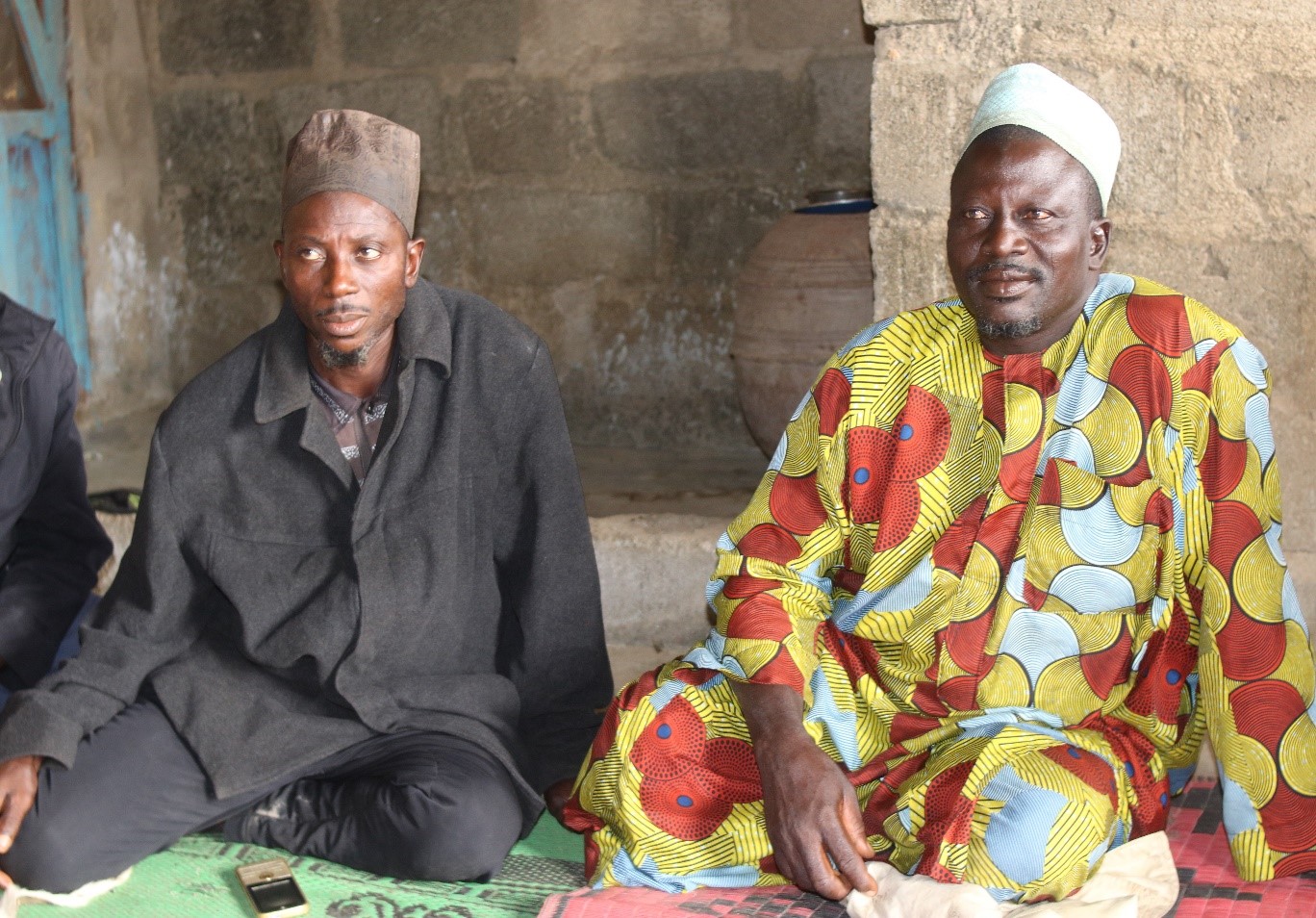 Alhaji Umaru Shaaba sitting on the right and another village chief