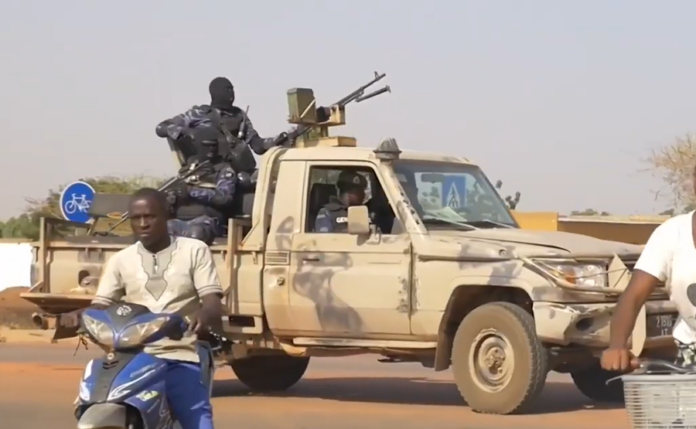 Burkinabe soldiers patrol after the January 2022 Burkina Faso coup d'état. Photo VOA news under CC license via Wikipedia.