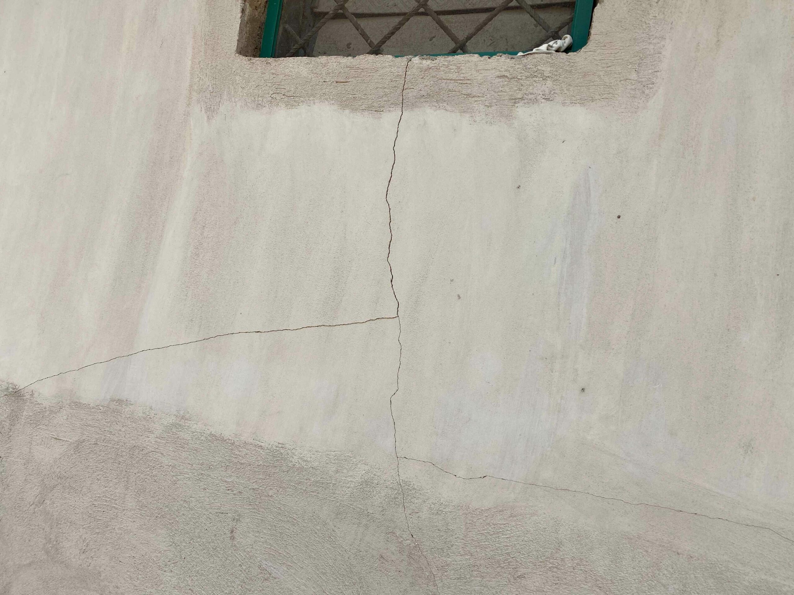 Part of the Moshood Aminullahi's house cracked due to the rock bomb blast at Surelere Community
