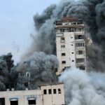 Destruction of the Palestine Tower in Gaza following an Israeli airstrike. Photo by Palestinian News & Information Agency (Wafa) in contract with APAimages, CC BY-SA 3.0, https://commons.wikimedia.org/w/index.php?curid=138775579