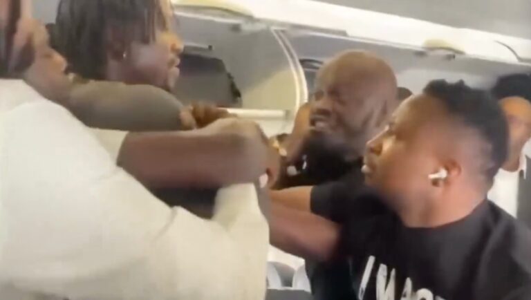 United Airline deboards VeryDarkMan, Mr Jollof after exchanging blows on aircraft