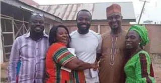 Onibiyo Segun with wife and friends after he was released. PC: PressReader