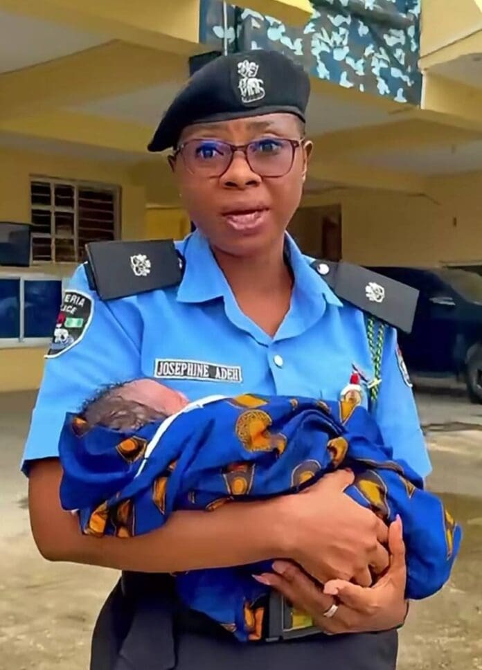 FCT Police spokesperson, Josephine Adeh, with one of the abandoned babies in Abuja